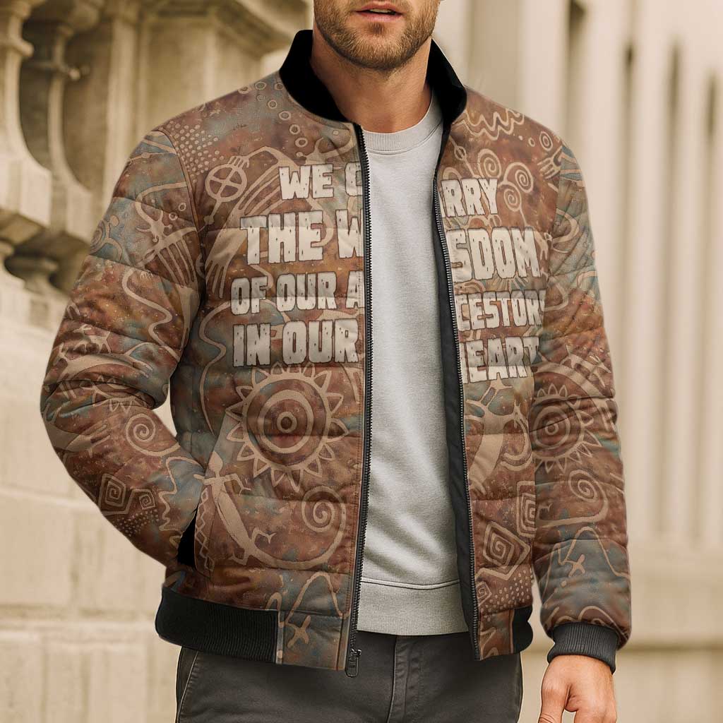 We Carry The Wisdom Bomber Puffer Jacket African Ancient Symbols, Earthy Tones, and Ancestral Wisdom Quote - Wonder Print Shop