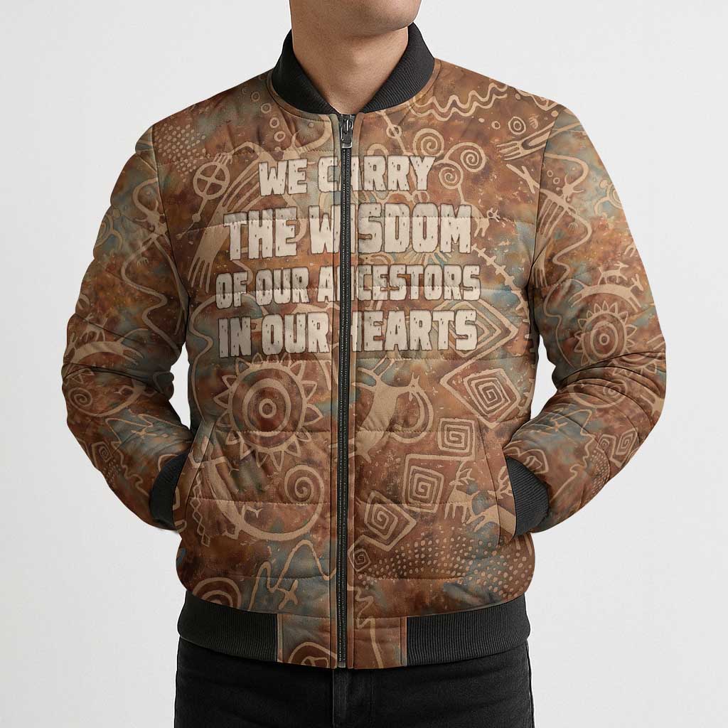 We Carry The Wisdom Bomber Puffer Jacket African Ancient Symbols, Earthy Tones, and Ancestral Wisdom Quote - Wonder Print Shop