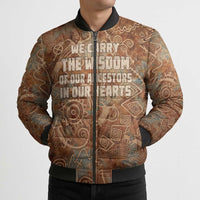 We Carry The Wisdom Bomber Puffer Jacket African Ancient Symbols, Earthy Tones, and Ancestral Wisdom Quote - Wonder Print Shop