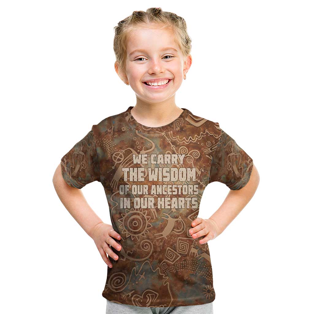 We Carry The Wisdom Kid T Shirt African Ancient Symbols, Earthy Tones, and Ancestral Wisdom Quote - Wonder Print Shop