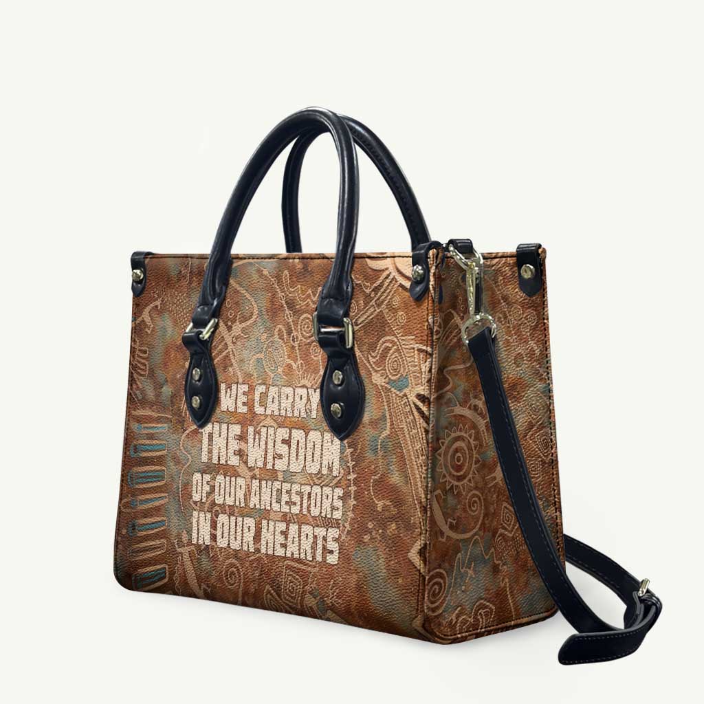 We Carry The Wisdom Leather Bag African Ancient Symbols, Earthy Tones, and Ancestral Wisdom Quote - Wonder Print Shop