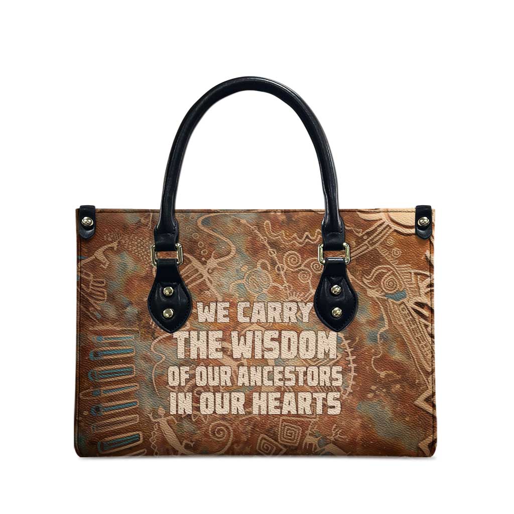 We Carry The Wisdom Leather Bag African Ancient Symbols, Earthy Tones, and Ancestral Wisdom Quote - Wonder Print Shop