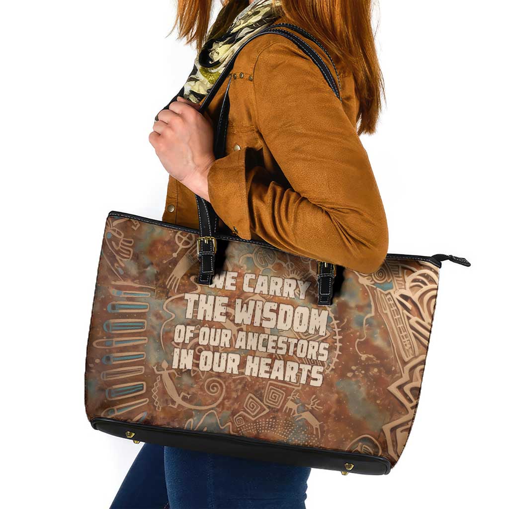 We Carry The Wisdom Leather Tote Bag African Ancient Symbols, Earthy Tones, and Ancestral Wisdom Quote - Wonder Print Shop