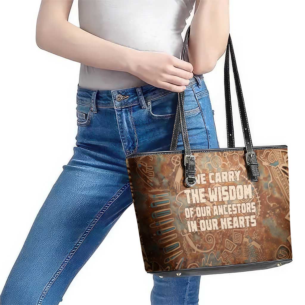We Carry The Wisdom Leather Tote Bag African Ancient Symbols, Earthy Tones, and Ancestral Wisdom Quote - Wonder Print Shop