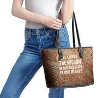 We Carry The Wisdom Leather Tote Bag African Ancient Symbols, Earthy Tones, and Ancestral Wisdom Quote - Wonder Print Shop