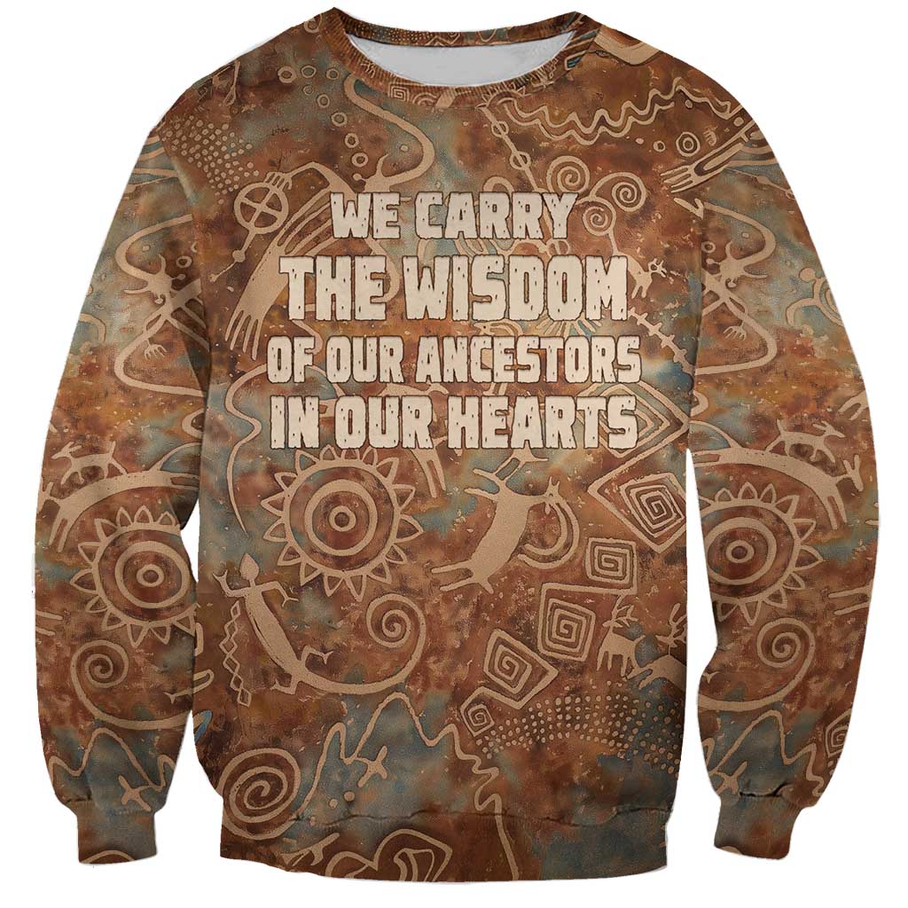 We Carry The Wisdom Sweatshirt African Ancient Symbols, Earthy Tones, and Ancestral Wisdom Quote - Wonder Print Shop