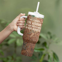 We Carry The Wisdom Tumbler With Handle African Ancient Symbols, Earthy Tones, and Ancestral Wisdom Quote - Wonder Print Shop