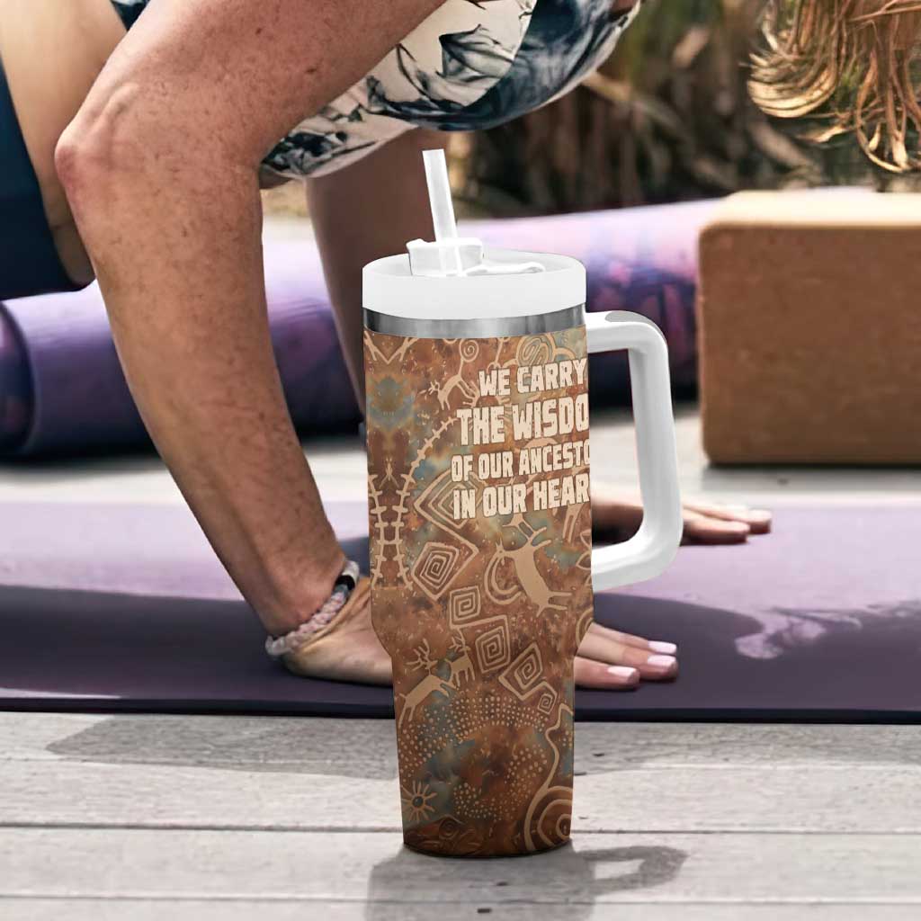 We Carry The Wisdom Tumbler With Handle African Ancient Symbols, Earthy Tones, and Ancestral Wisdom Quote - Wonder Print Shop