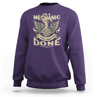 Purple crewneck mechanic sweatshirt with winged “DONE” graphic on the front.
