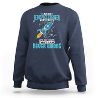 Navy crewneck sweatshirt with colorful astronaut graphic and tech-style text print on chest