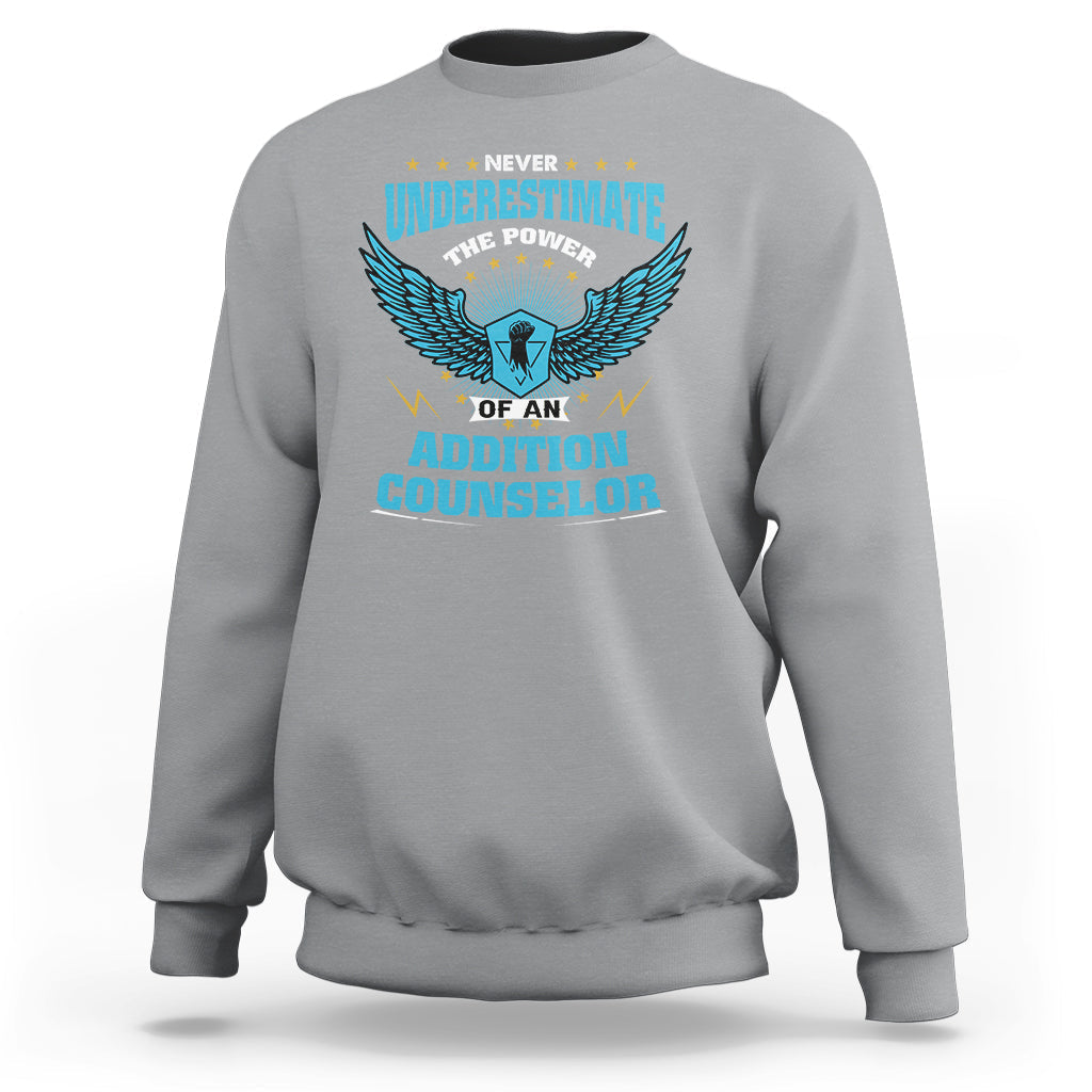 Sport gray crewneck sweatshirt with front eagle graphic and 'Addiction Counselor' text