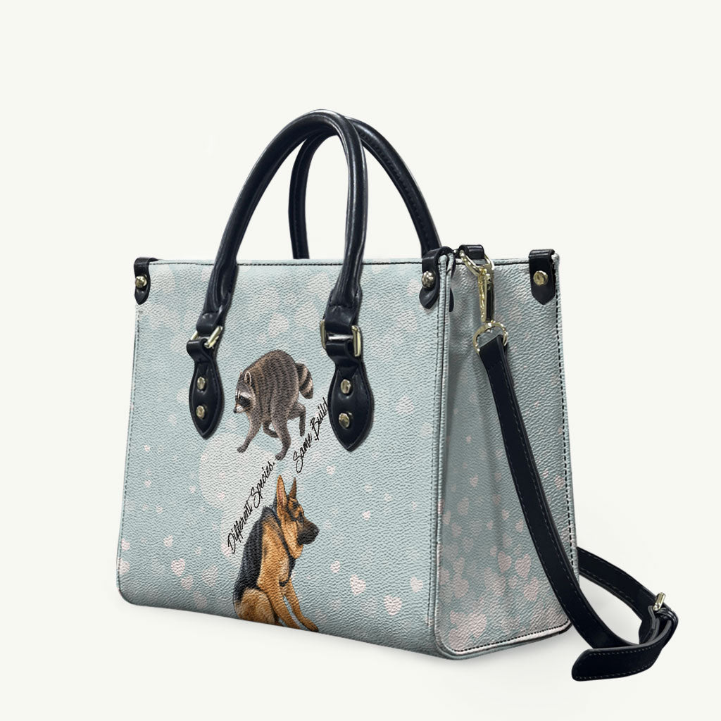 Jimothy The Raccoon And Dogs Leather Bag Different Species Same Build Inspirational Heart