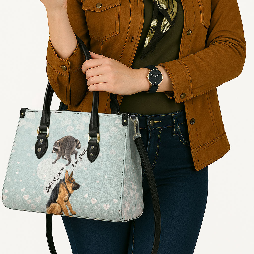 Jimothy The Raccoon And Dogs Leather Bag Different Species Same Build Inspirational Heart