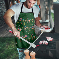 Ornaments on Green Snowy Background Apron with Electric Guitars Santa Candy Canes - Wonder Print Shop