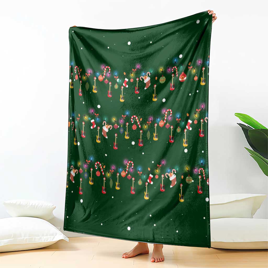 Ornaments on Green Snowy Background Blanket with Electric Guitars Santa Candy Canes - Wonder Print Shop