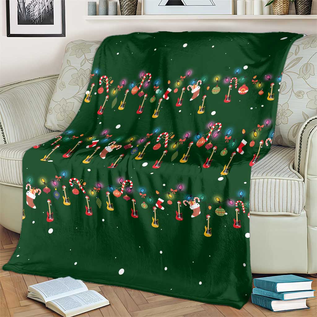 Ornaments on Green Snowy Background Blanket with Electric Guitars Santa Candy Canes - Wonder Print Shop