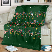 Ornaments on Green Snowy Background Blanket with Electric Guitars Santa Candy Canes - Wonder Print Shop