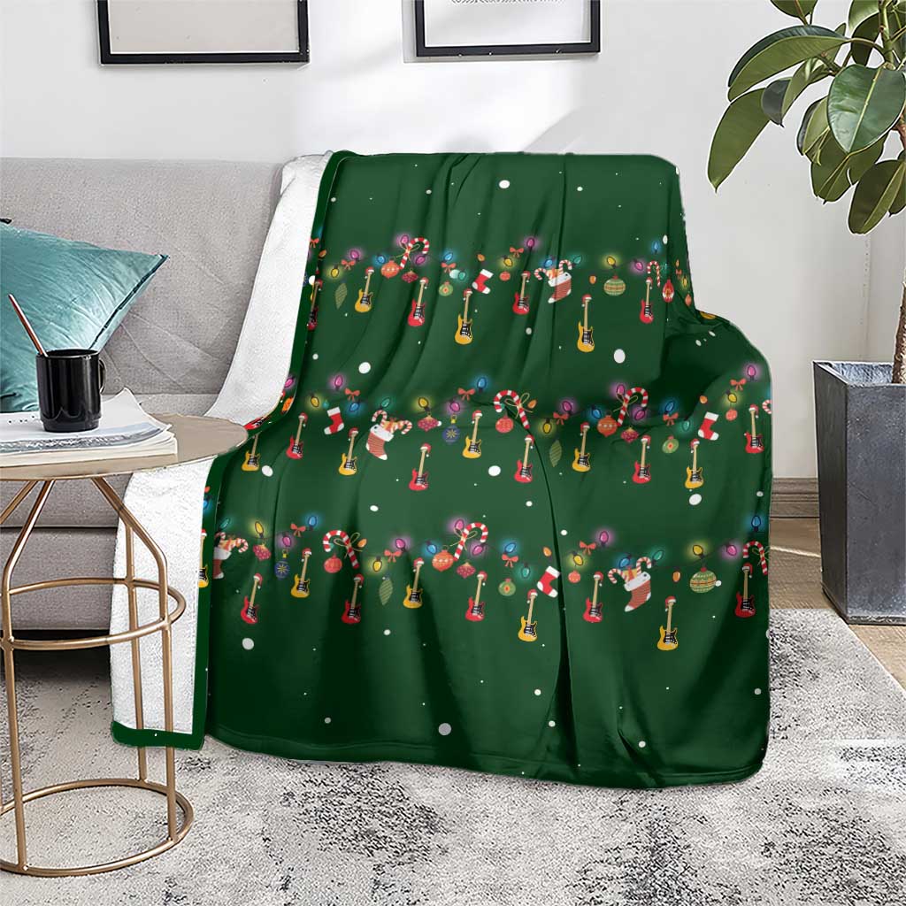 Ornaments on Green Snowy Background Blanket with Electric Guitars Santa Candy Canes - Wonder Print Shop
