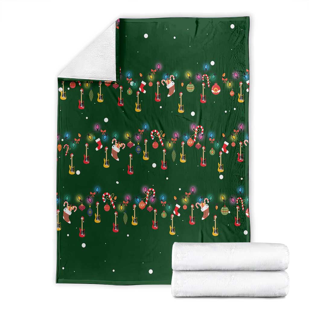 Ornaments on Green Snowy Background Blanket with Electric Guitars Santa Candy Canes - Wonder Print Shop