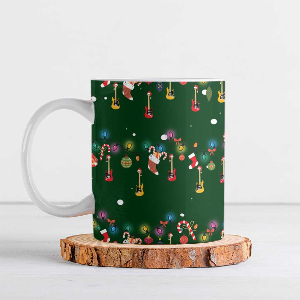 Ornaments on Green Snowy Background Ceramic Mug with Electric Guitars Santa Candy Canes - Wonder Print Shop