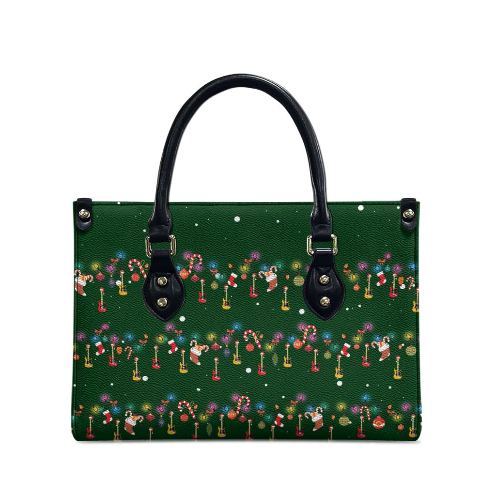 Ornaments on Green Snowy Background Leather Bag with Electric Guitars Santa Candy Canes - Wonder Print Shop