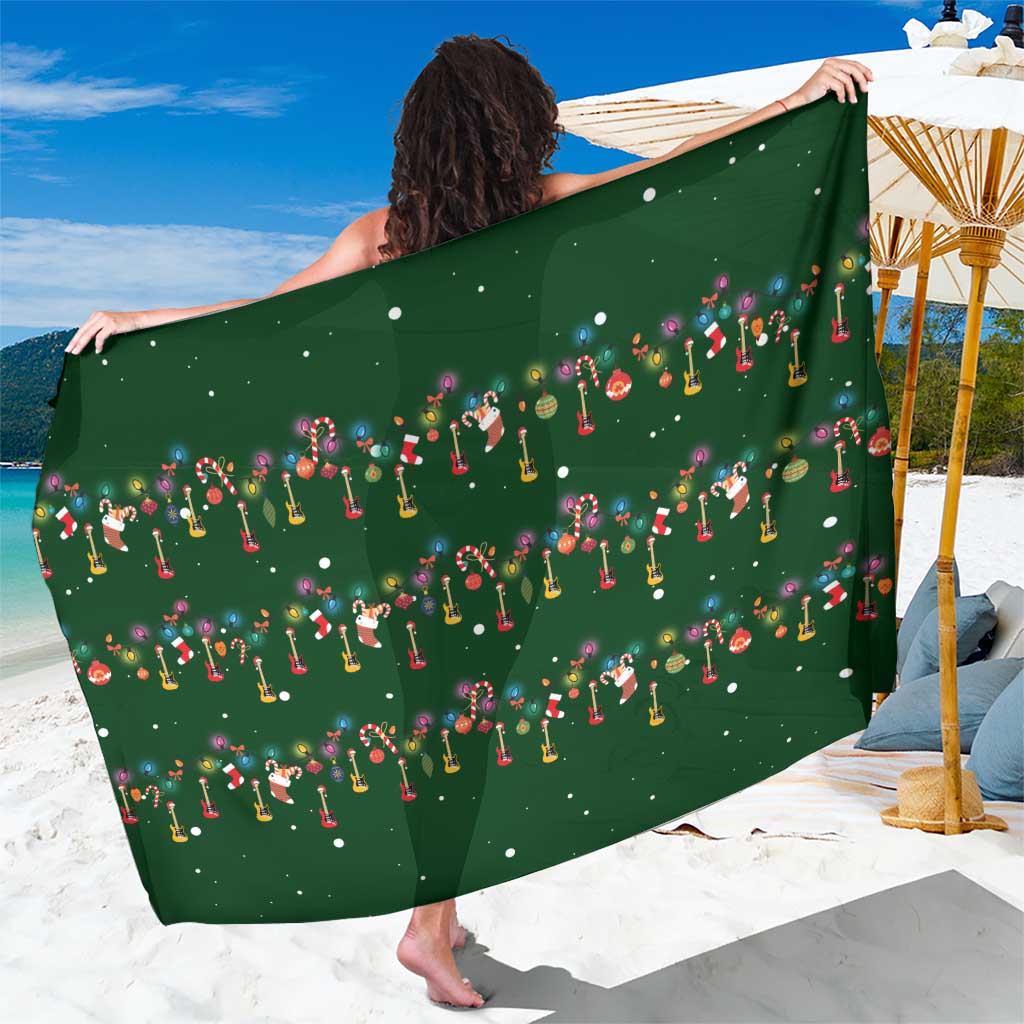 Ornaments on Green Snowy Background Sarong with Electric Guitars Santa Candy Canes - Wonder Print Shop