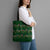 Ornaments on Green Snowy Background Tote Bag with Electric Guitars Santa Candy Canes - Wonder Print Shop