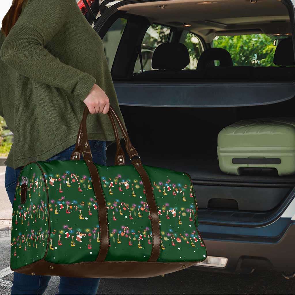 Ornaments on Green Snowy Background Travel Bag with Electric Guitars Santa Candy Canes - Wonder Print Shop