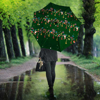 Ornaments on Green Snowy Background Umbrella with Electric Guitars Santa Candy Canes - Wonder Print Shop