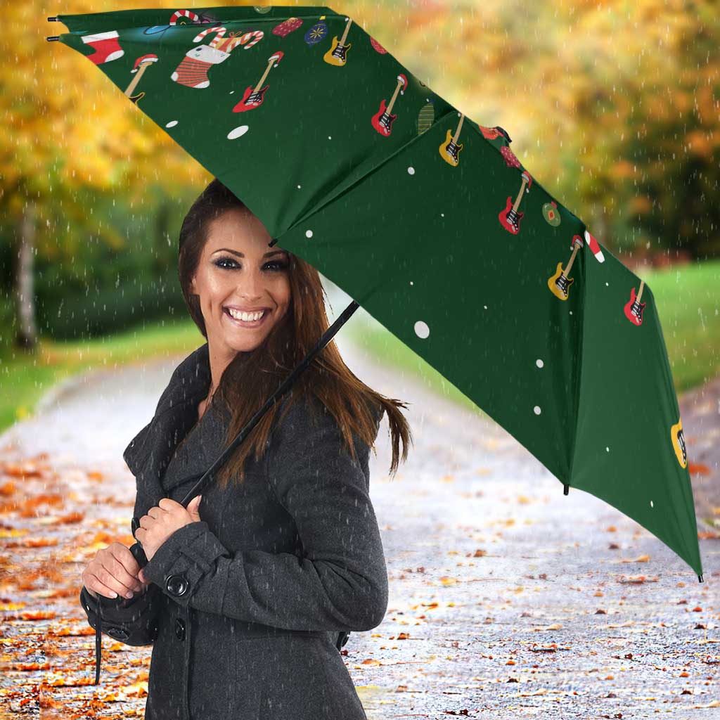 Ornaments on Green Snowy Background Umbrella with Electric Guitars Santa Candy Canes - Wonder Print Shop