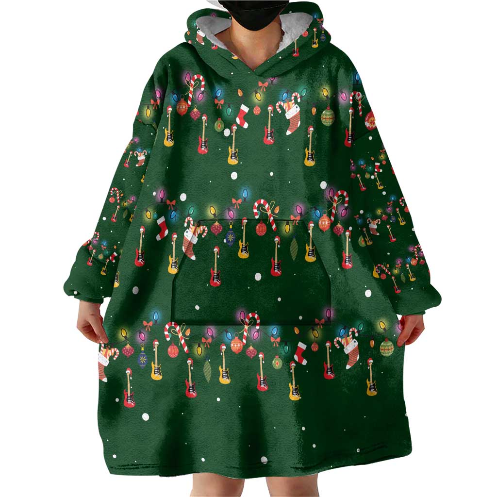 Ornaments on Green Snowy Background Wearable Blanket Hoodie with Electric Guitars Santa Candy Canes - Wonder Print Shop