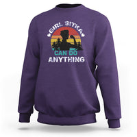 Girls purple crewneck sweatshirt with "CAN DO ANYTHING" outdoor graphic on front