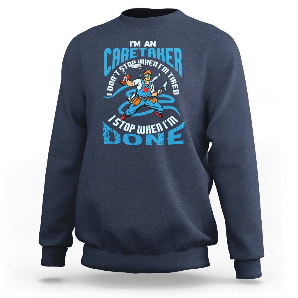 Navy sweatshirt with caregiver motivational graphic on the chest