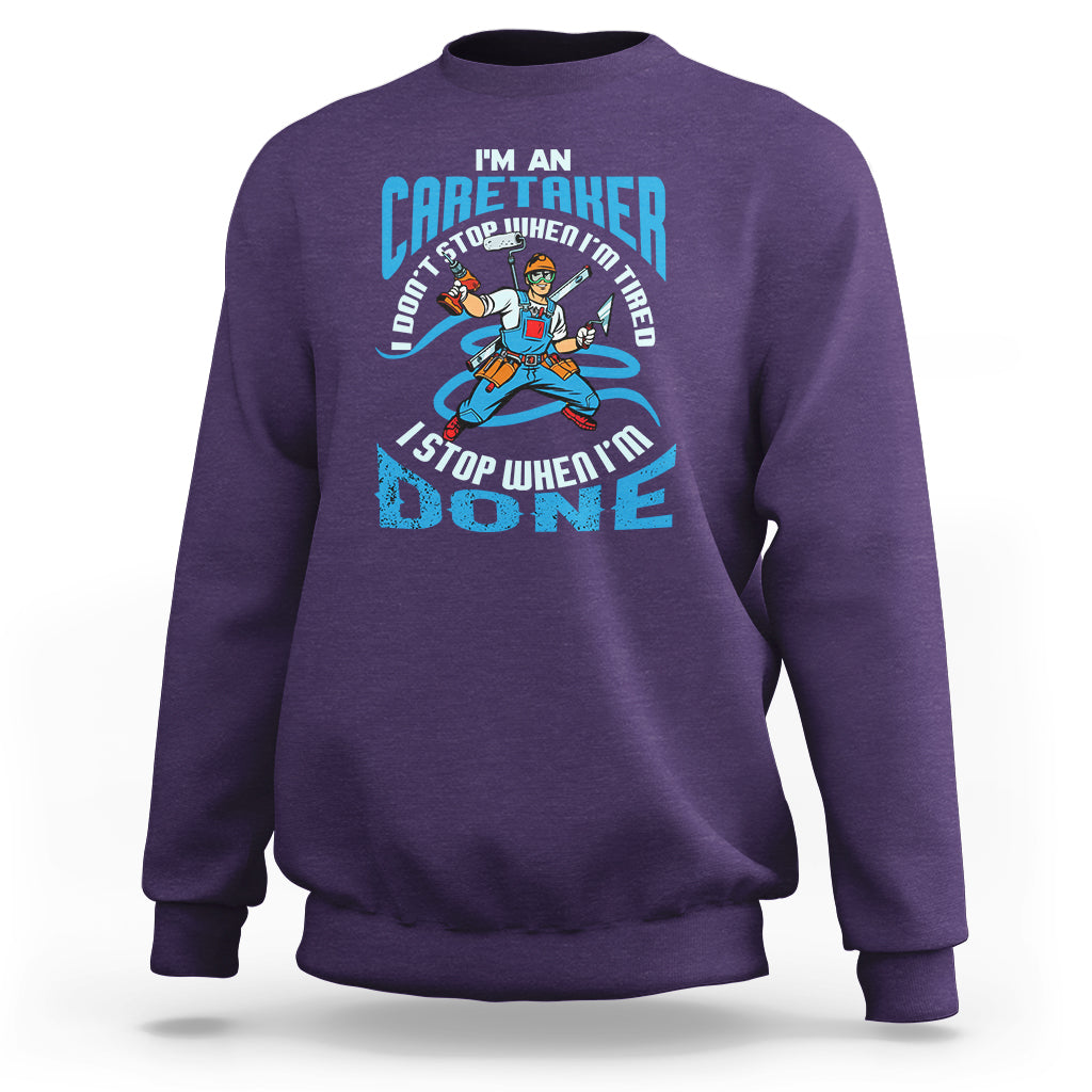 Purple sweatshirt with caregiver motivational graphic on the chest