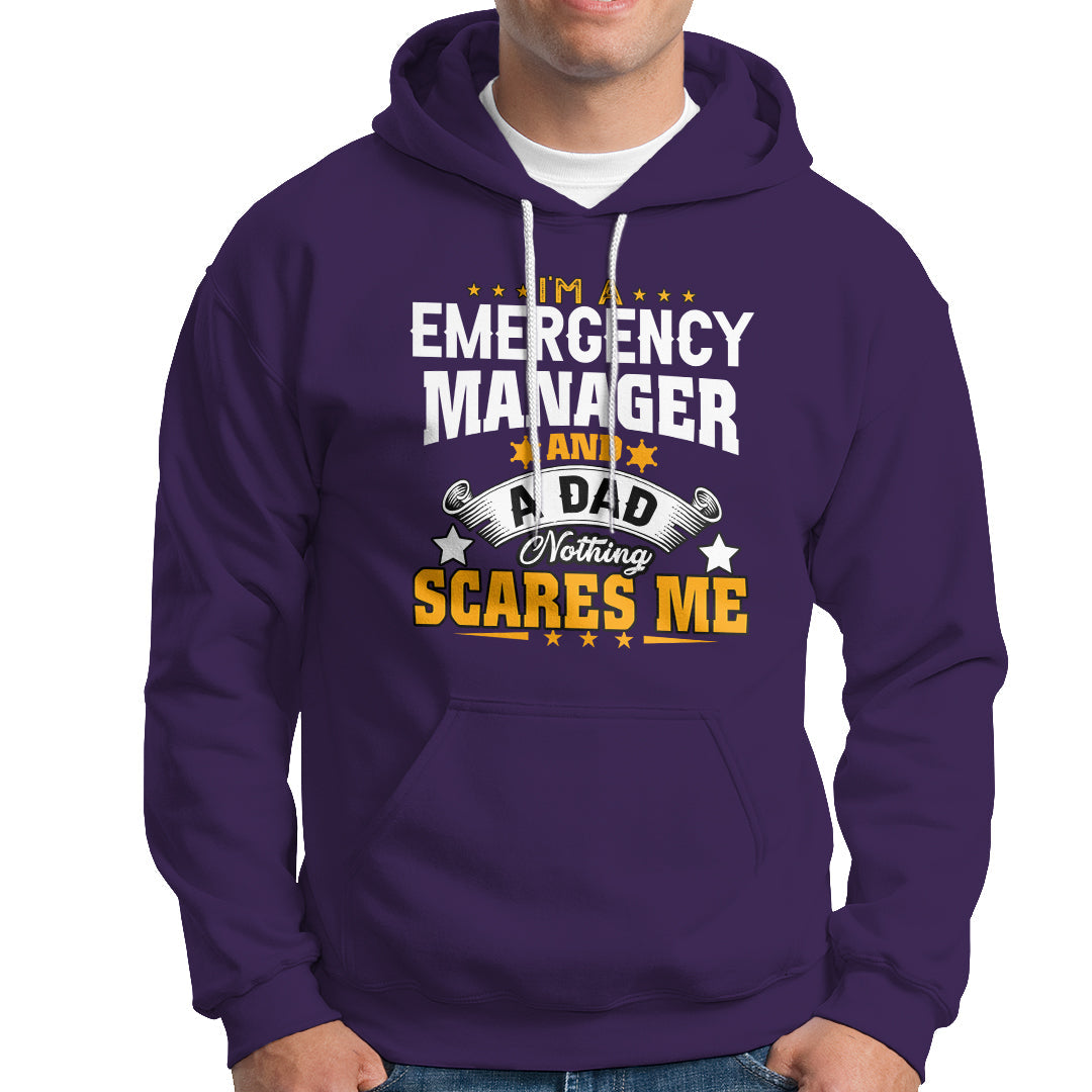 Purple hoodie with “Emergency Manager” dad slogan graphic; front kangaroo pocket.