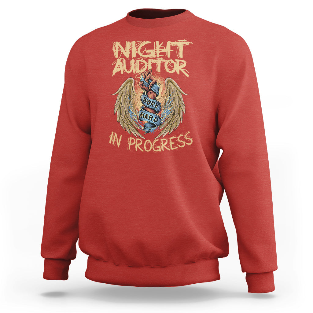 Red crewneck sweatshirt with Night Auditor in progress angel emblem