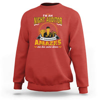Red crewneck sweatshirt with bold yellow graphic front text and character art