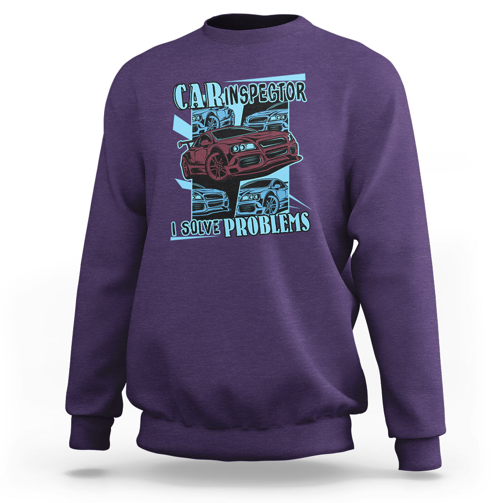 Purple crewneck sweatshirt with colorful car inspector graphic and slogan on chest