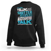 Black crewneck sweatshirt with colorful 'Shutter Driver' 'That's how we talk' print