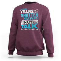 Maroon crewneck sweatshirt with colorful 'Shutter Driver' 'That's how we talk' print