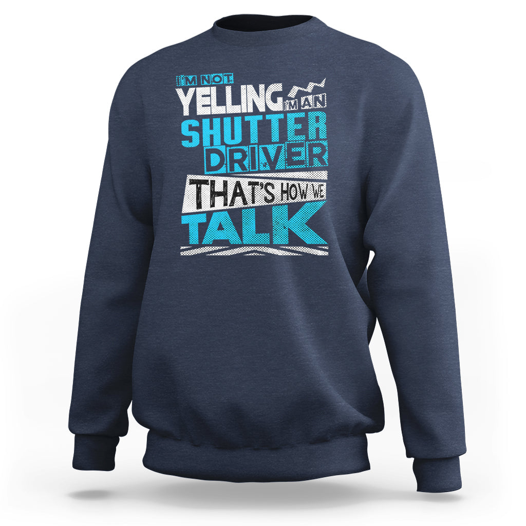 Navy crewneck sweatshirt with colorful 'Shutter Driver' 'That's how we talk' print