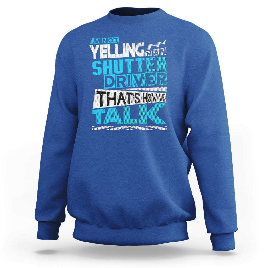 Royal blue crewneck sweatshirt with colorful 'Shutter Driver' 'That's how we talk' print