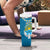 Kyrgyzstan Mountain Sunrise Tumbler With Handle with Blue with Eagle, Sun, and National Flag Design
