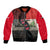 Iraq Flag Texture Bomber Jacket with Golden Eagle Emblem and Cracked Earth Background Design - Wonder Print Shop