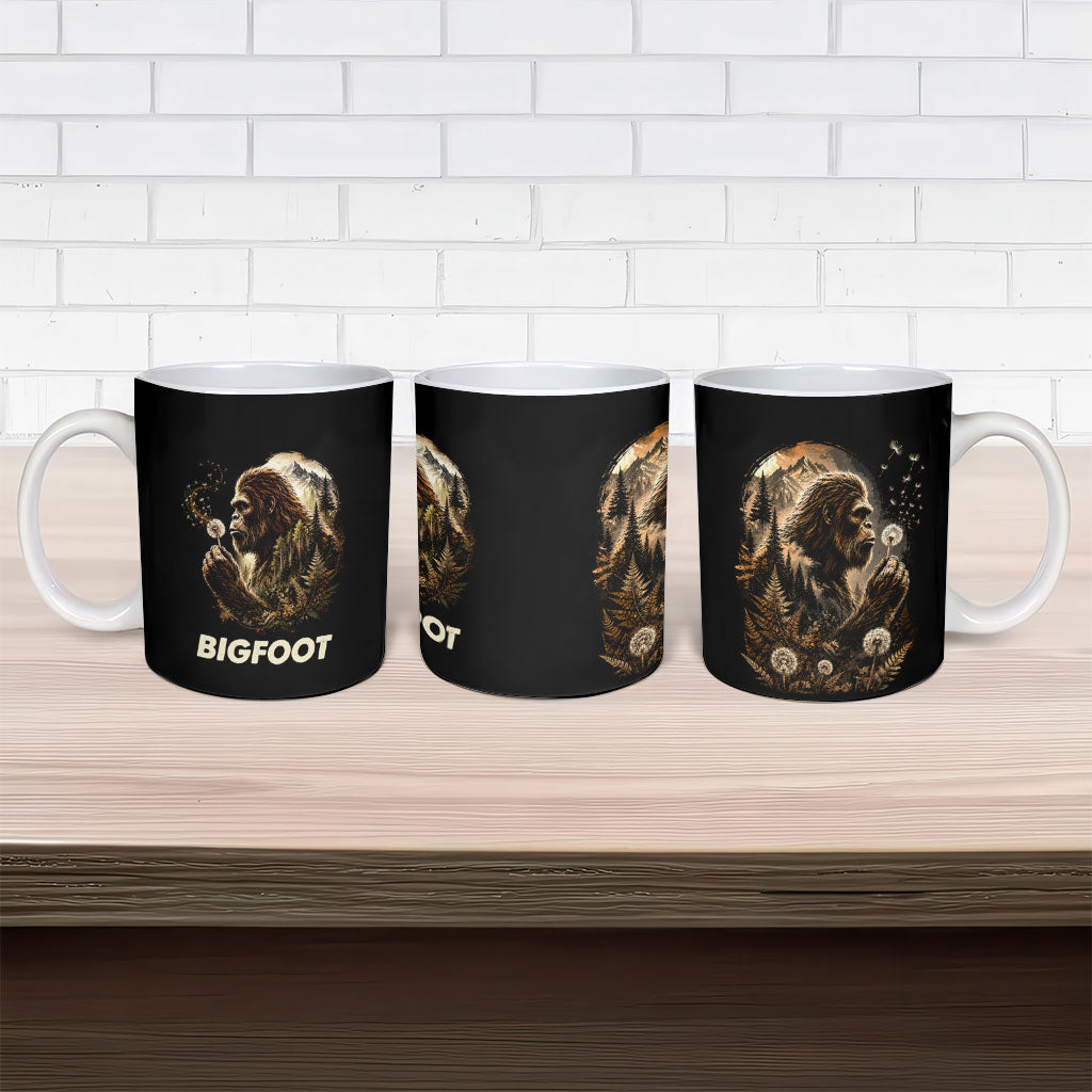 Bigfoot Blowing Wishes Dandelion Ceramic Mug Vintage Sasquatch Art Forest Mountain Nature