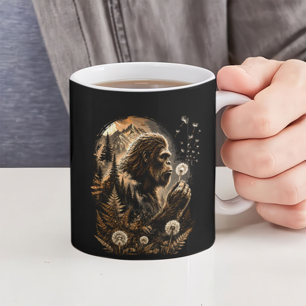 Bigfoot Blowing Wishes Dandelion Ceramic Mug Vintage Sasquatch Art Forest Mountain Nature