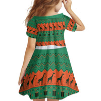 Giraffes Decorating Tree Gifts Family Matching Puletasi and Hawaiian Shirt with Orange Green Holiday Pattern Design - Wonder Print Shop