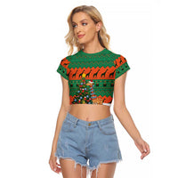 Giraffes Decorating Tree Gifts Raglan Cropped T Shirt with Orange Green Holiday Pattern Design - Wonder Print Shop