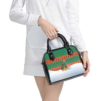 Giraffes Decorating Tree Gifts Shoulder Handbag with Orange Green Holiday Pattern Design - Wonder Print Shop