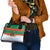 Giraffes Decorating Tree Gifts Shoulder Handbag with Orange Green Holiday Pattern Design - Wonder Print Shop